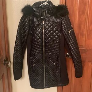 Light weight coat. Beautiful fit.